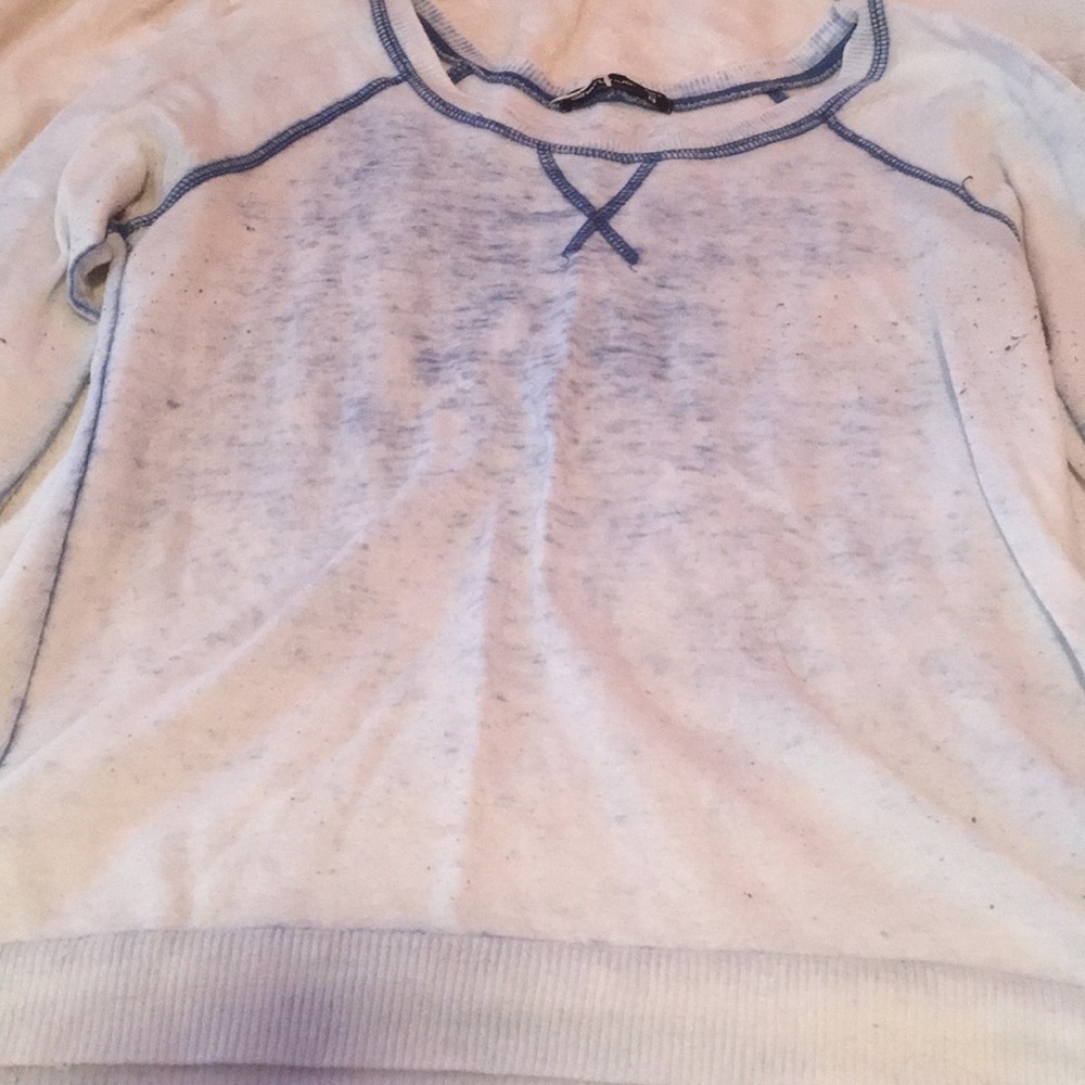 White long sleeve with blue accents